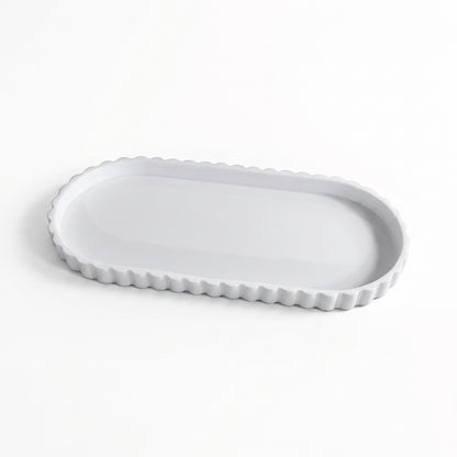 Plateau de rangement ovale en silicone à bord ondulé