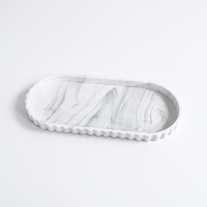 Plateau de rangement ovale en silicone à bord ondulé