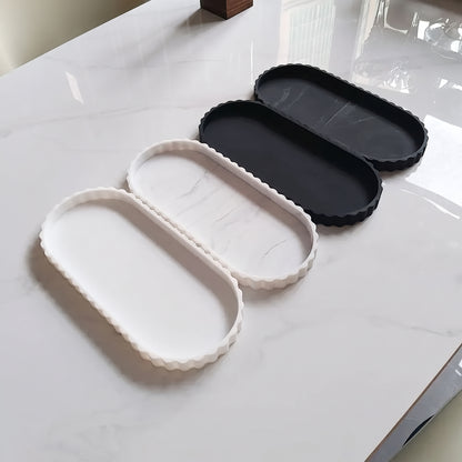 Plateau de rangement ovale en silicone à bord ondulé